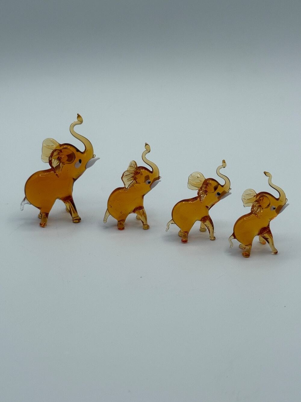 Vintage Amber Glass Elephant Figurines Lot of 4 Miniature Trunk Up 1.5-2"